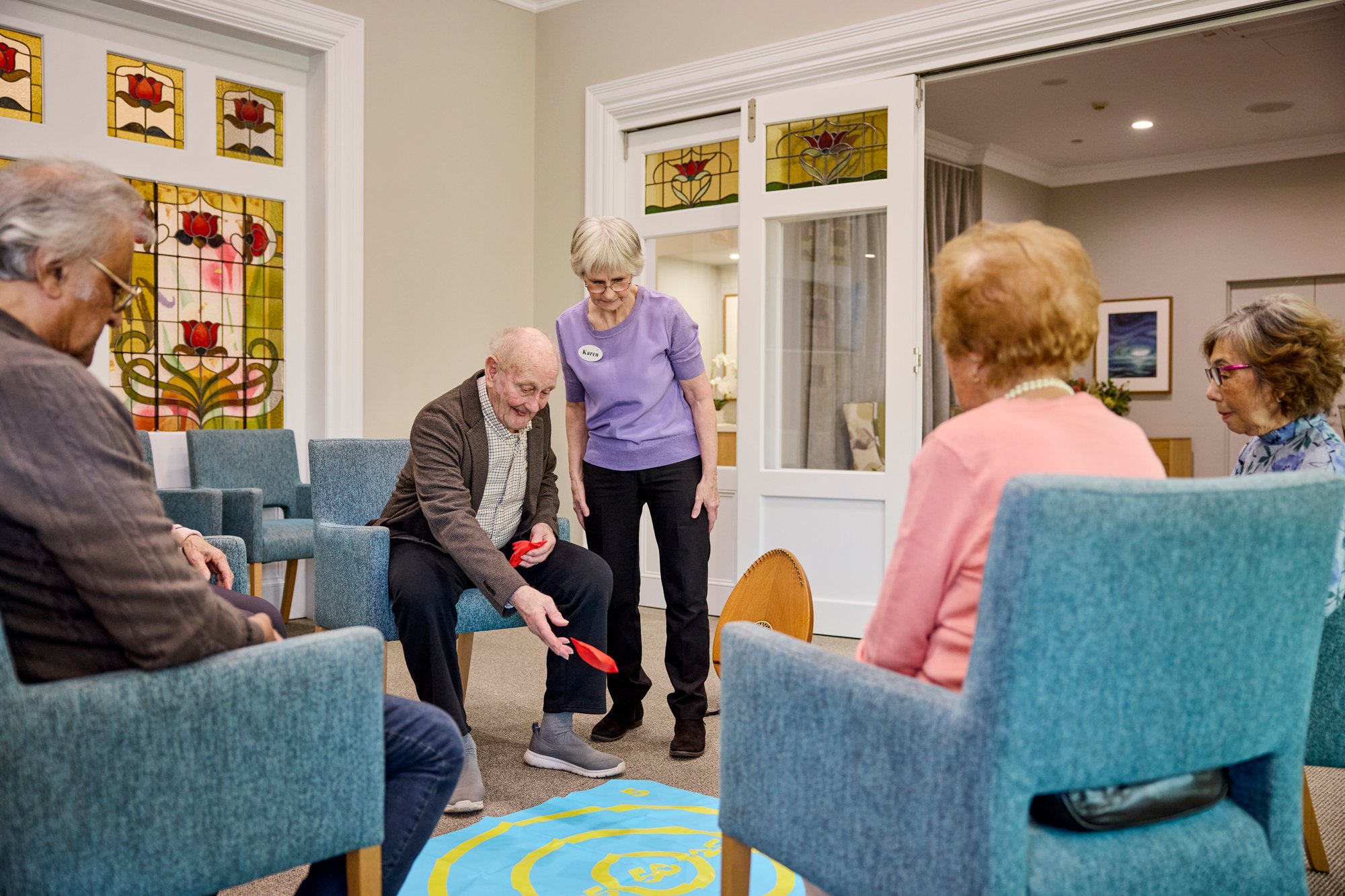 Elderly residents enjoying recreational group activities